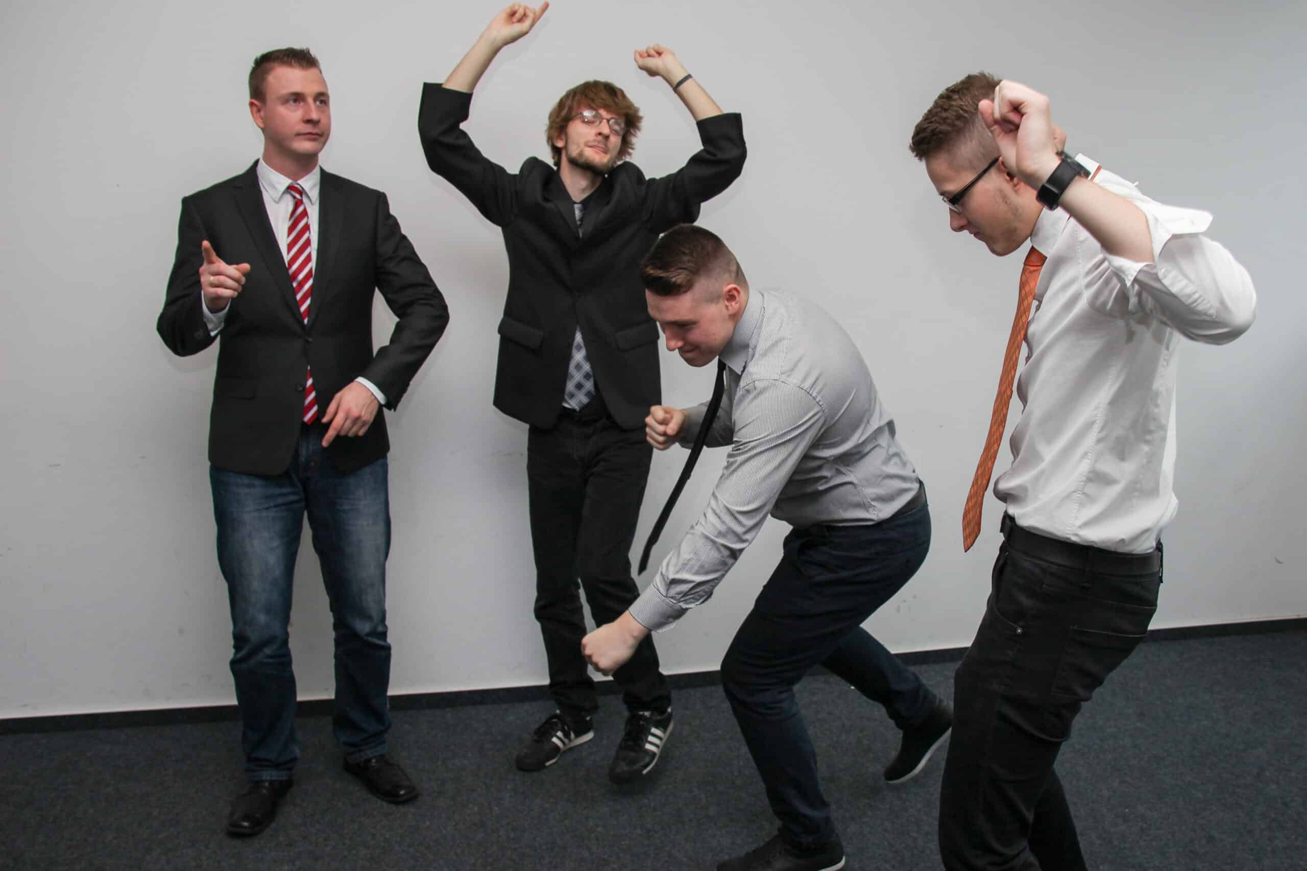 Lawyers celebrating the superior features of Quilia over Case Status in client management
