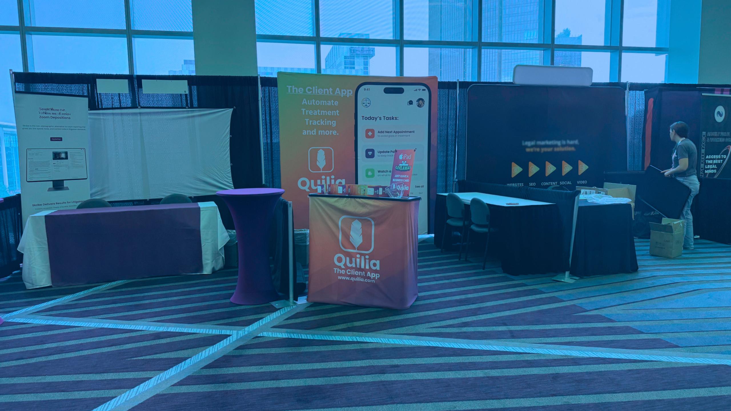 Crowded tradeshow floor with banners and attendees representing the AI boom A busy conference scene with a surge of AI-branded booths at legaltech events.