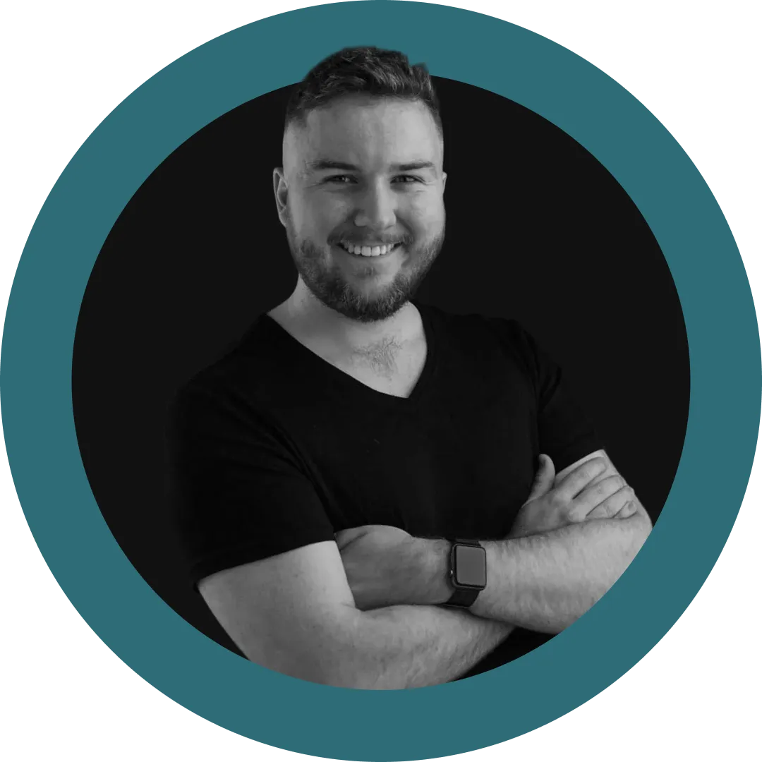 A headshot of Eamon McKiernan, Director of Mintyy, smiling.