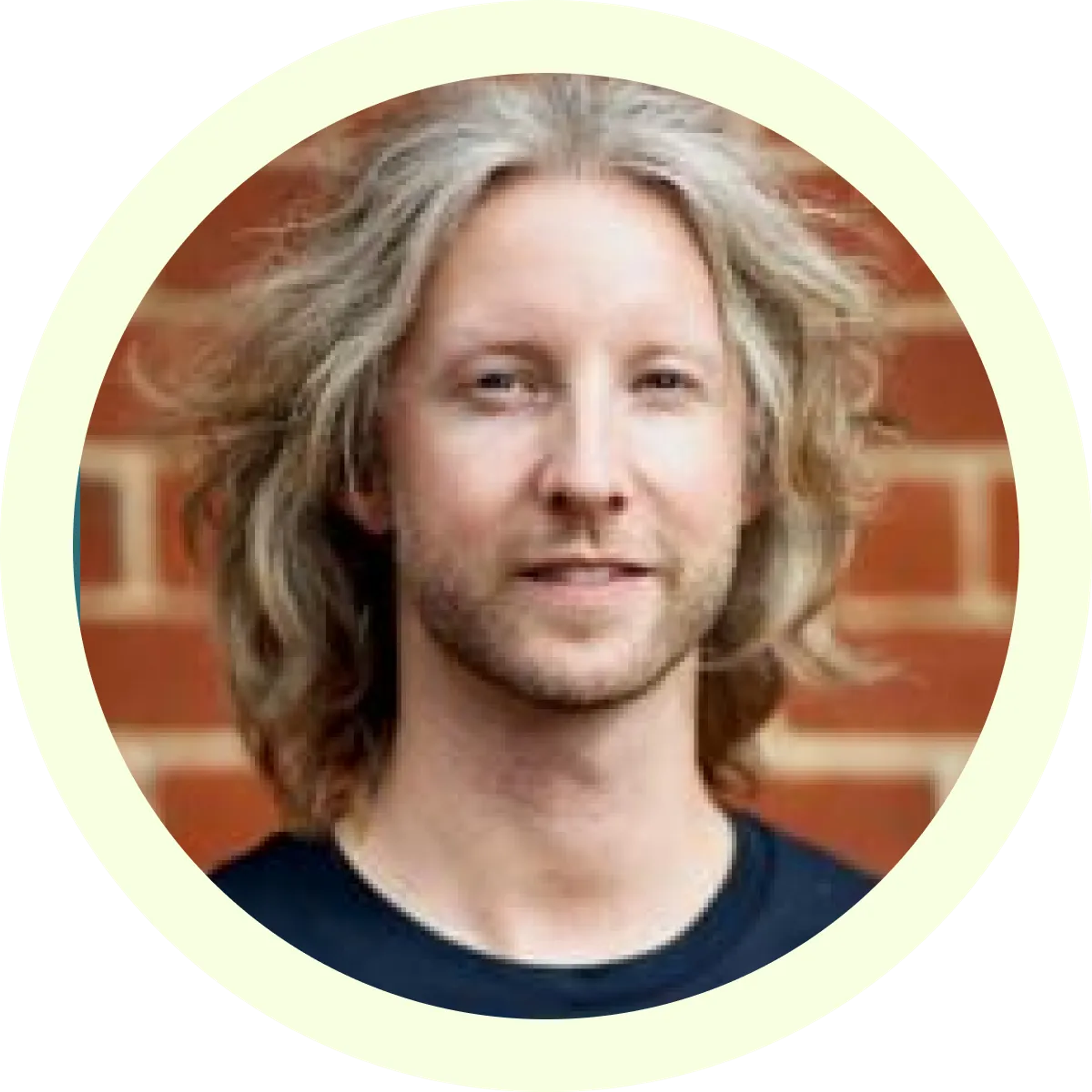 A headshot of Chris Plunkett.