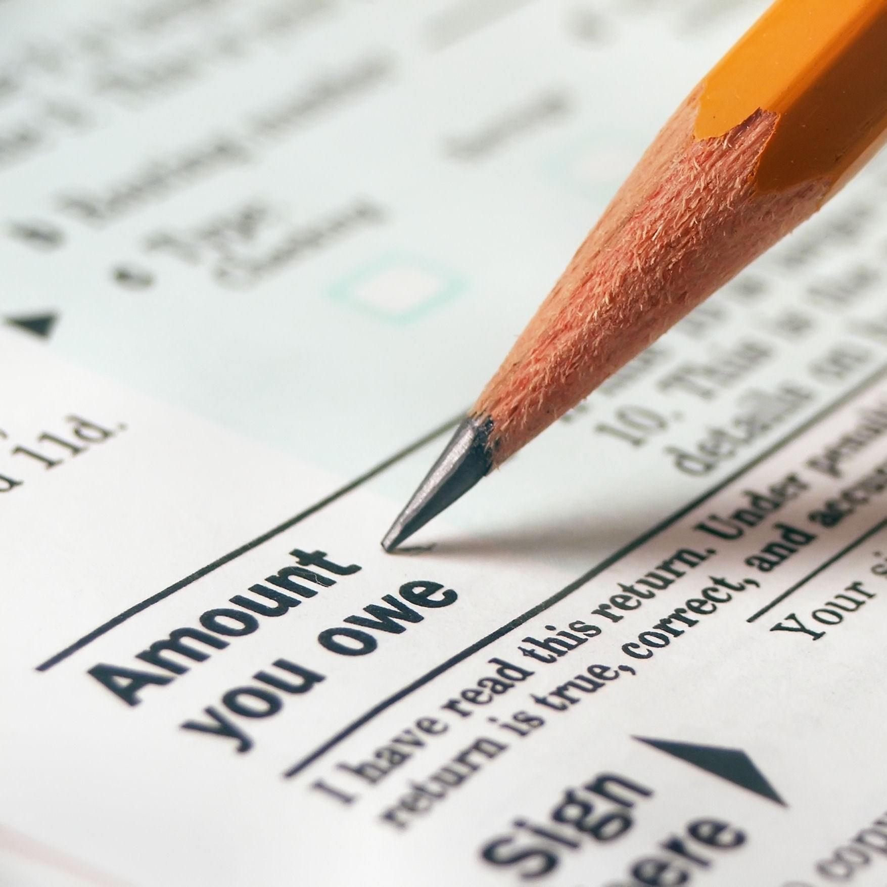 The Implications of Owing Back Taxes and How to Tackle Them Effectively