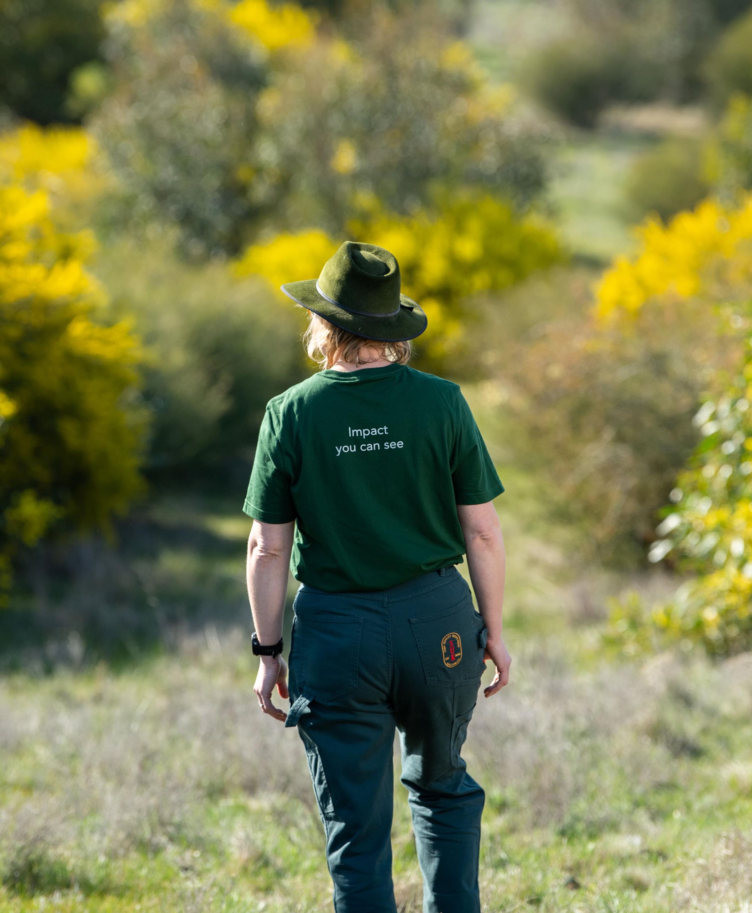 Land Life staff walking into restoration site