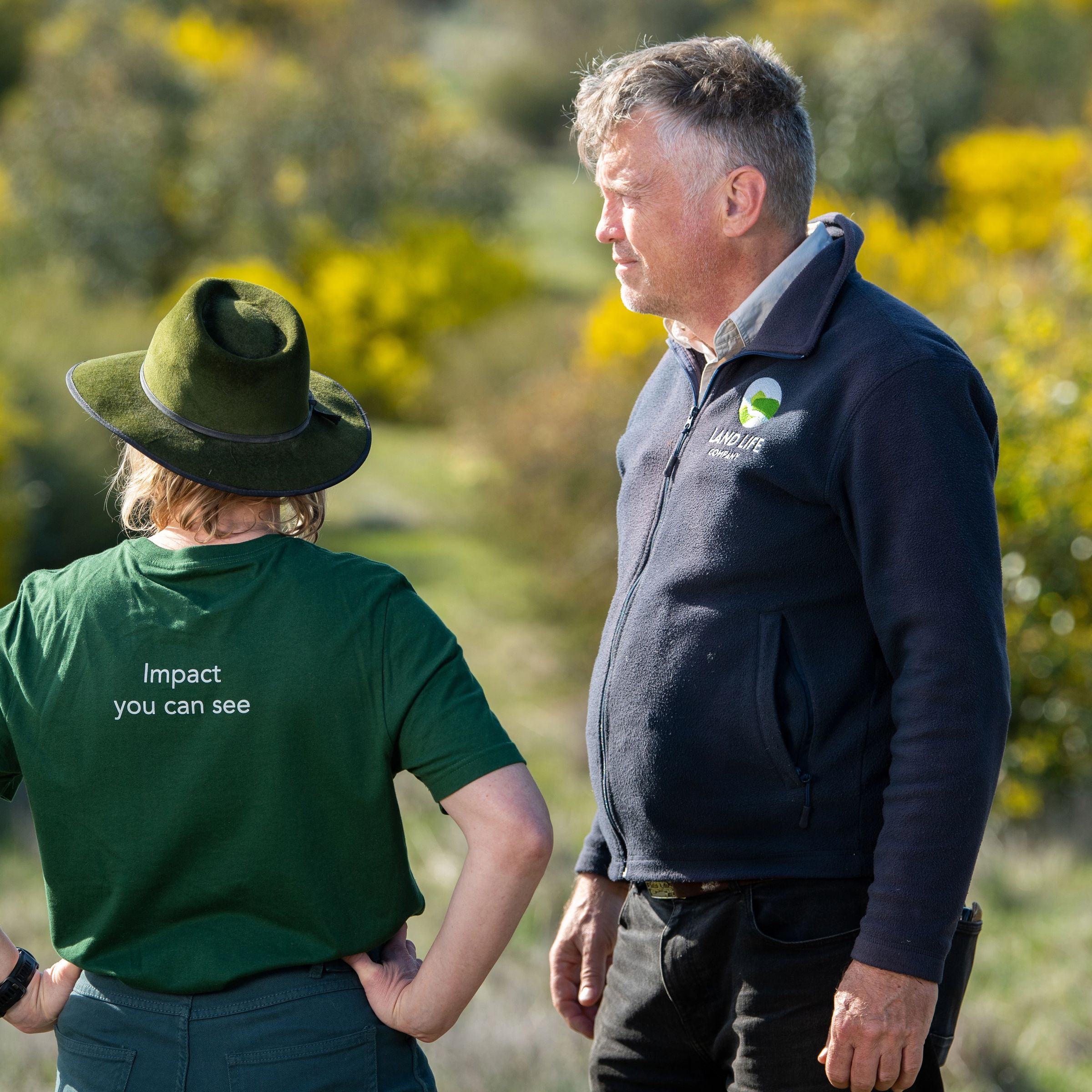 Two people on reforestation site