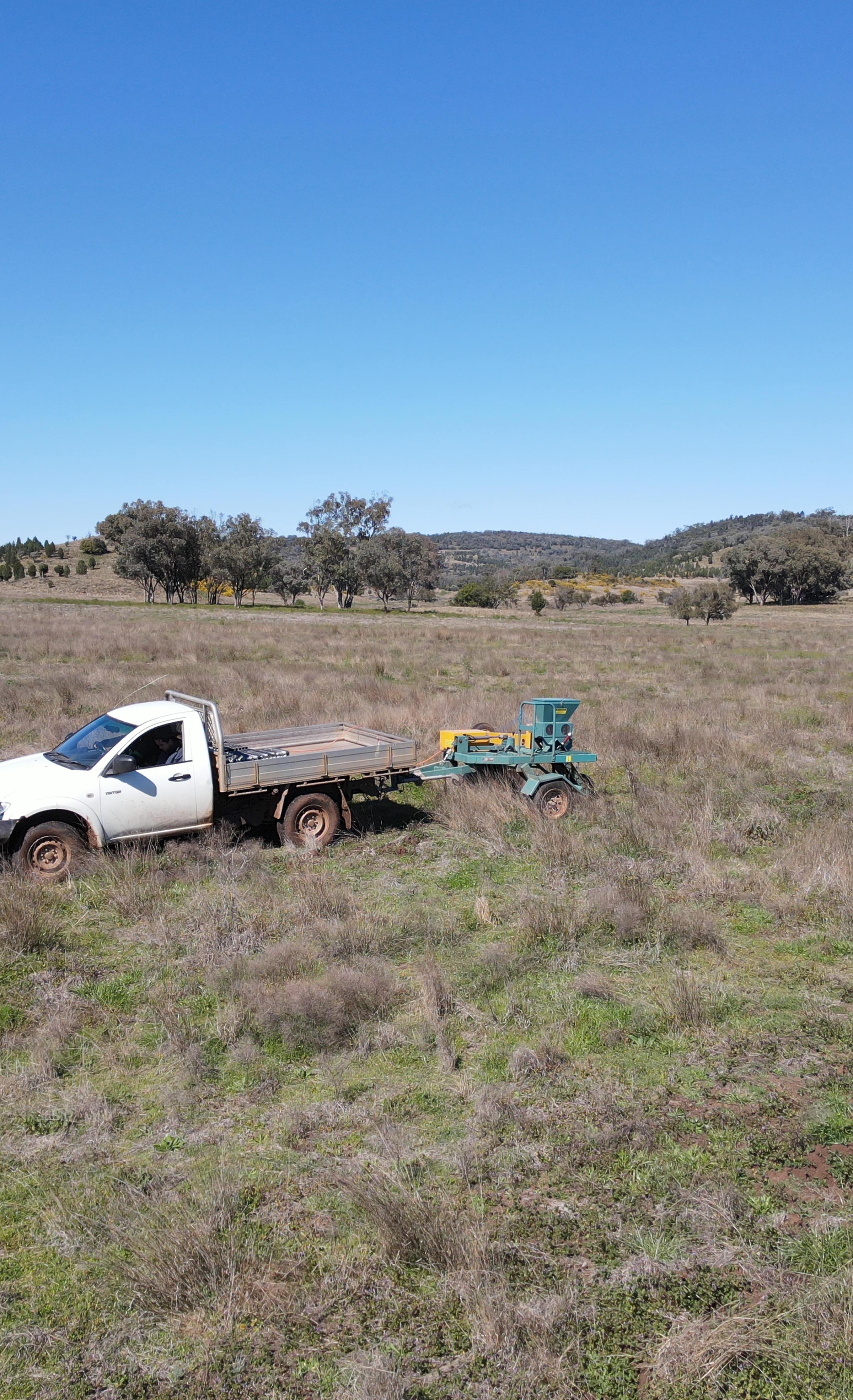 Ute driving on degraded farmland