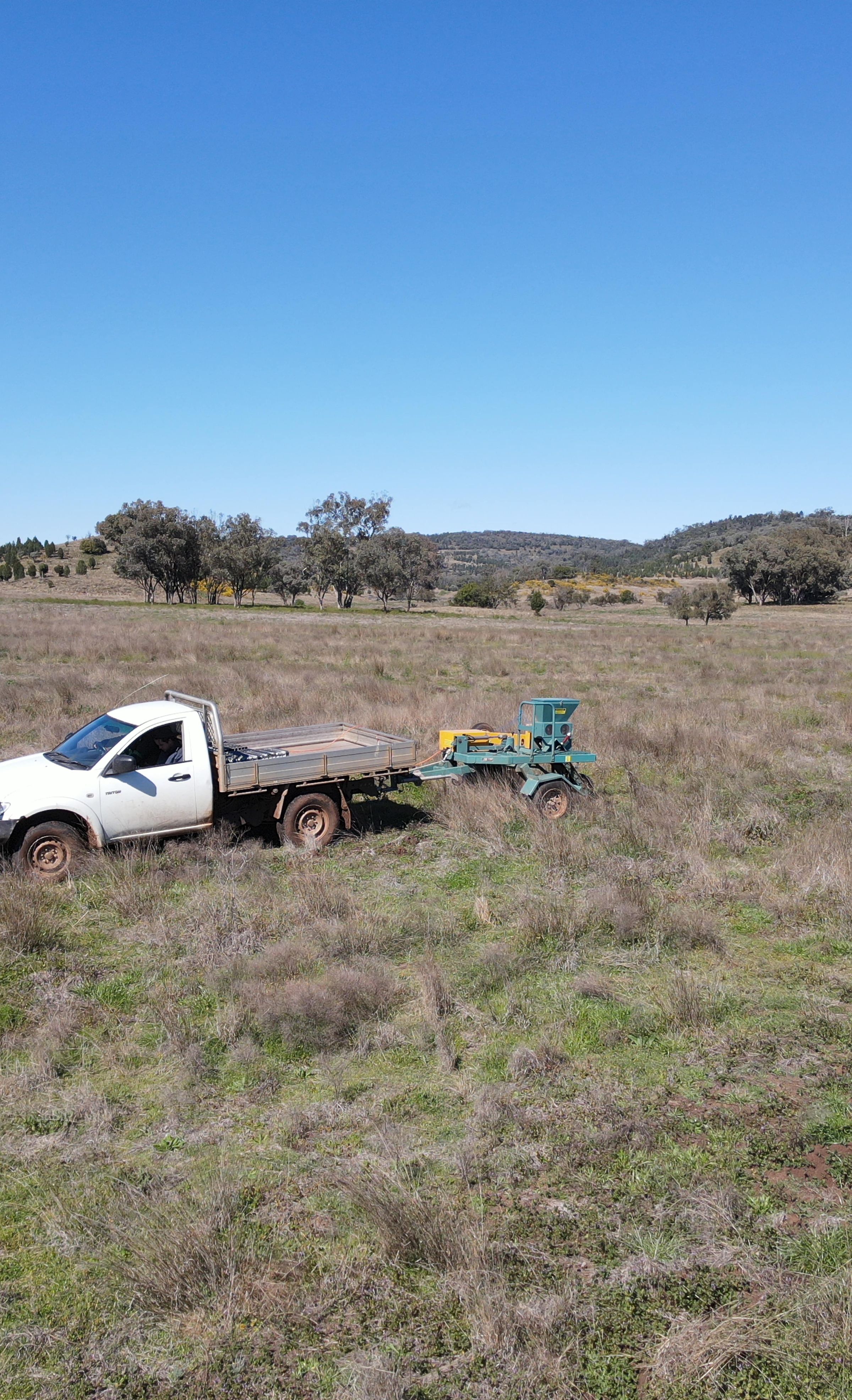 Ute driving on degraded farmland