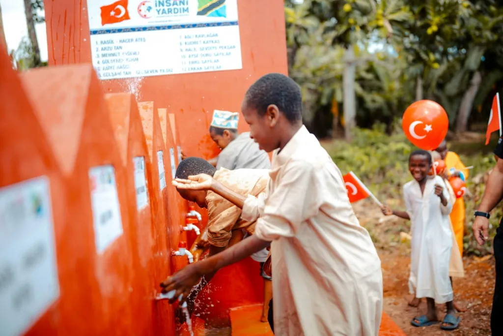 African children near a new fresh water system