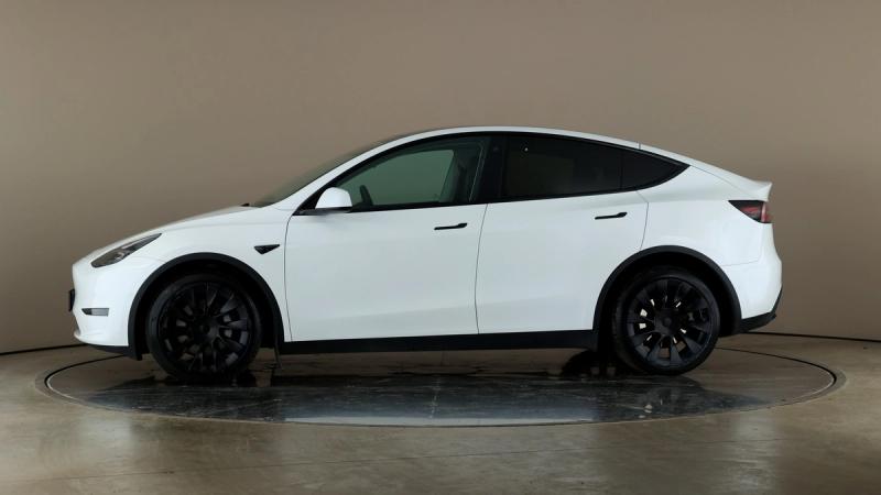 Tesla model y white side left