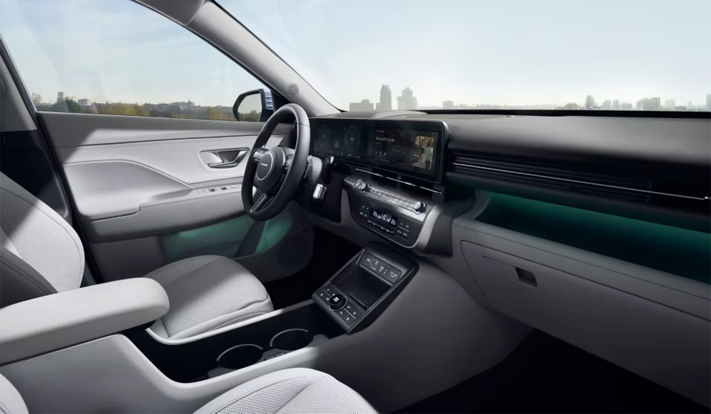 Interior shot of the Hyundai Kona showing the infotainment system & steering wheel