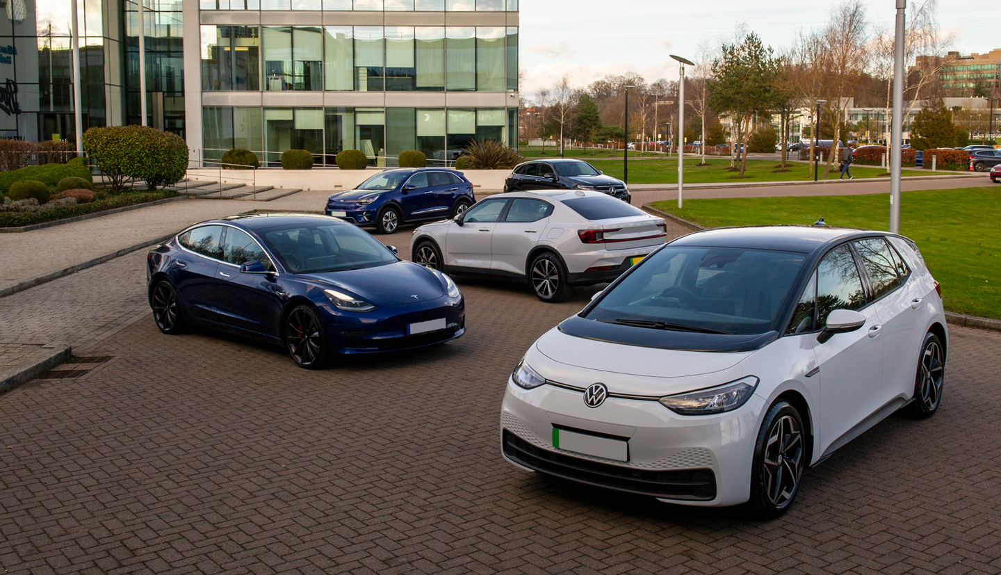 5 electric cars lined up at different angles 