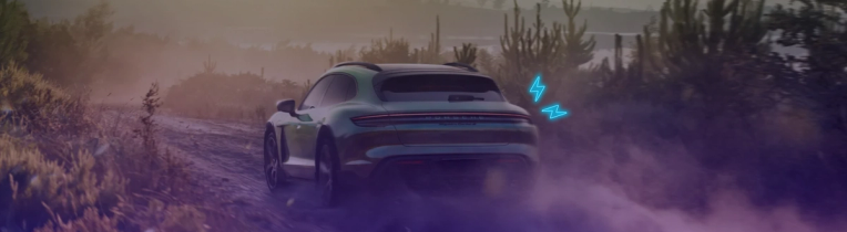 Electric car driving through rough terrain