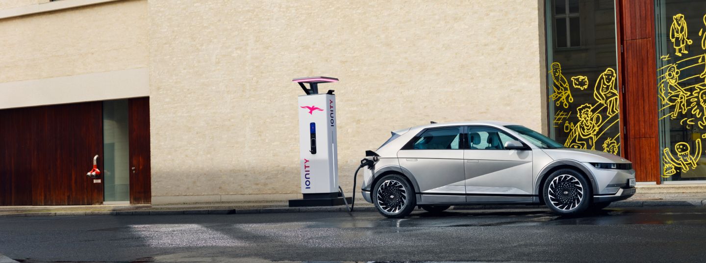 Futuristic looking car plugged into Ionity rapid charger