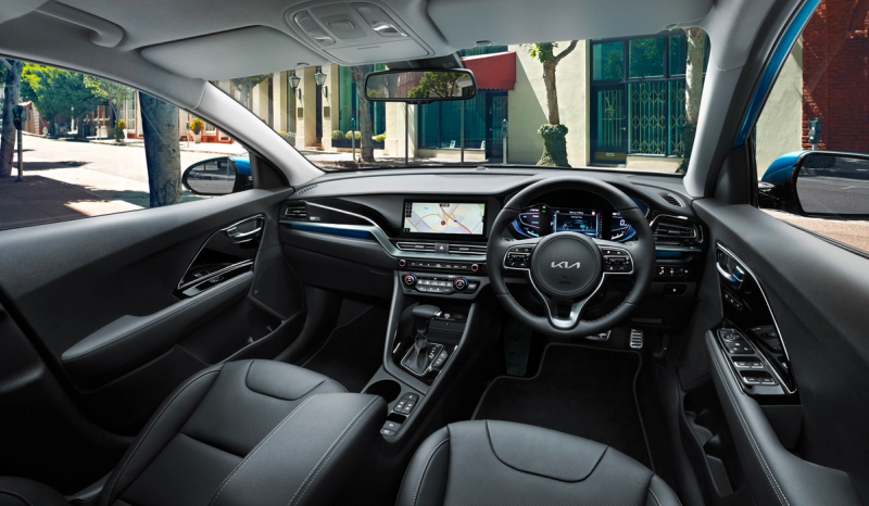 Interior shot of the KIA e-niro displaying the steering wheel and dashboard
