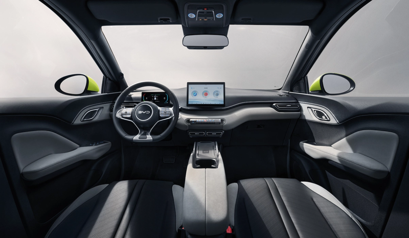 Interior shot of the BYD Dolphin Surf displaying the steering wheel and dashboard
