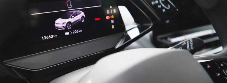 internal dashboard of an EV showing the range of a battery