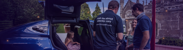 Customers getting expert advice from an EV specialist