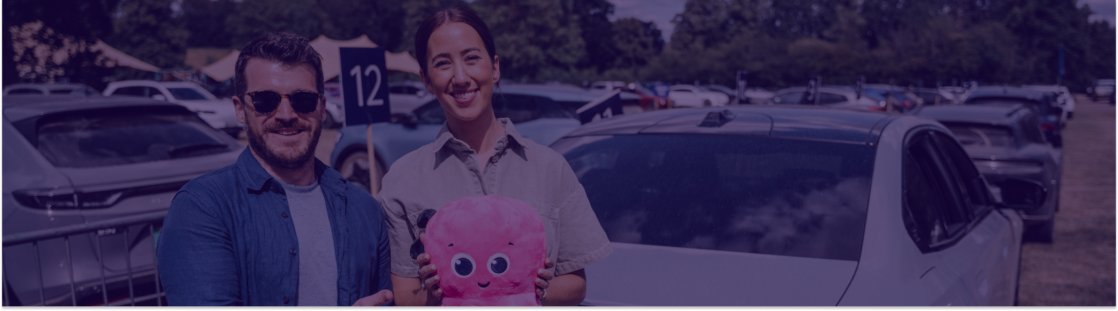 employees-holding-an-octopus-plushie