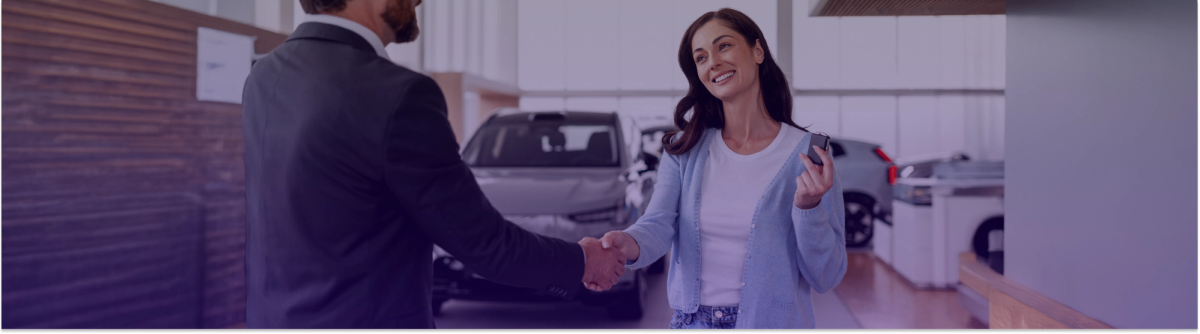 Happy customer in a car dealership 