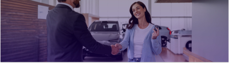 Happy customer in a car dealership 