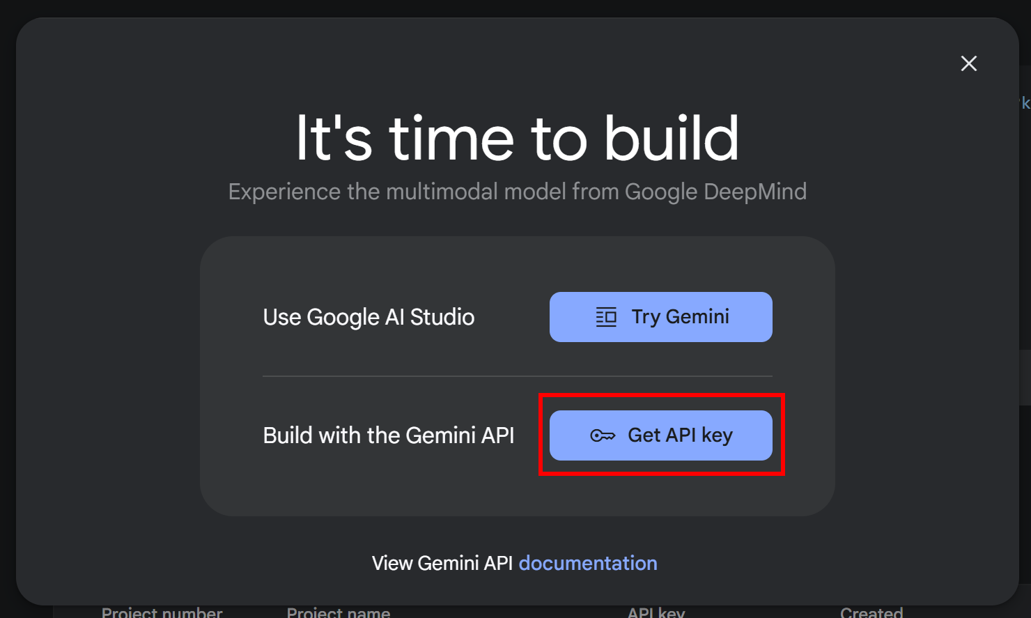 A pop-up window titled 'It's time to build' displays options for using Google AI Studio and obtaining an API key for the Gemini API, featuring two blue buttons labeled 'Try Gemini' and 'Get API key'.