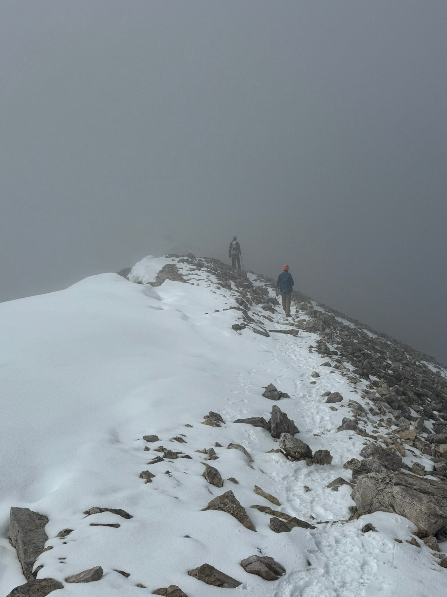 Ridgleline in the fog near the summit of Mt Temple in Banff - Canadian Rockies