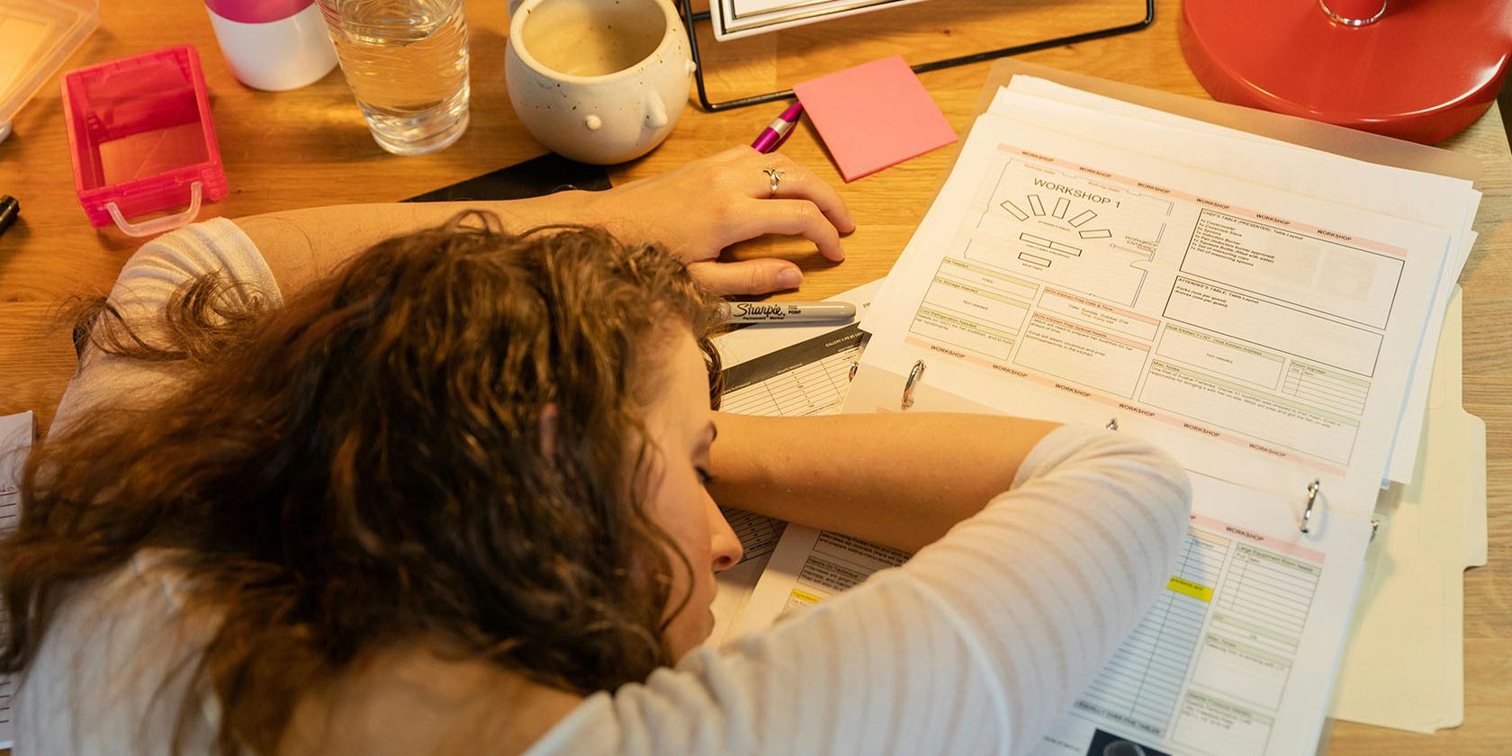 Woman frustrated with her old way of handling invoices.