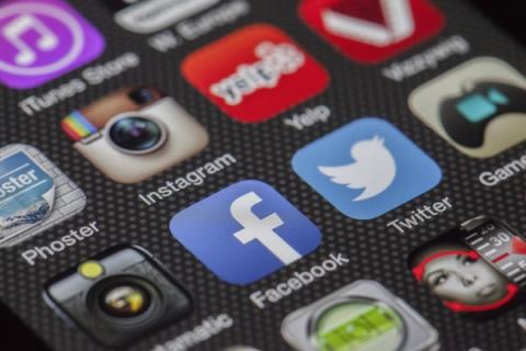 Facebook icon displayed on an iPhone screen