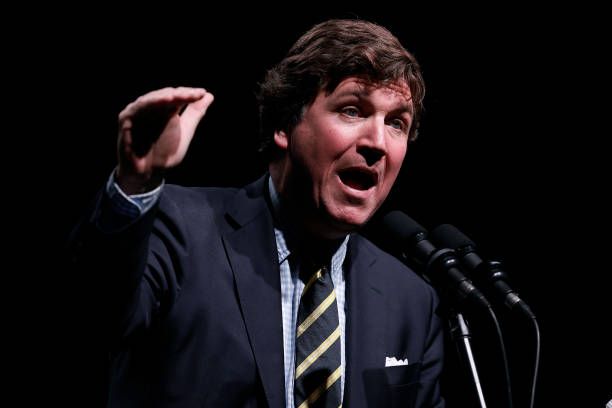 MTG, Tucker Carlson Urge Trump to Keep U.S. Out of Iran Conflict, Revealing MAGA Rift