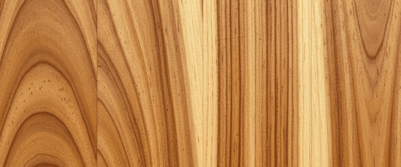 Guanacaste wood boards showing two distinct wood grain patterns one with dramatic cathedral arches