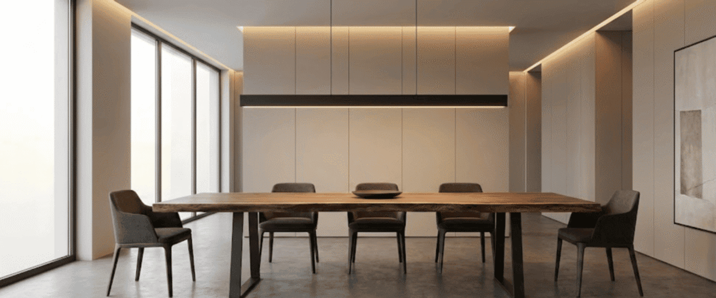 Minimalist dining room with a long wooden table, six modern chairs, floor-to-ceiling windows, soft recessed lighting, neutral tones