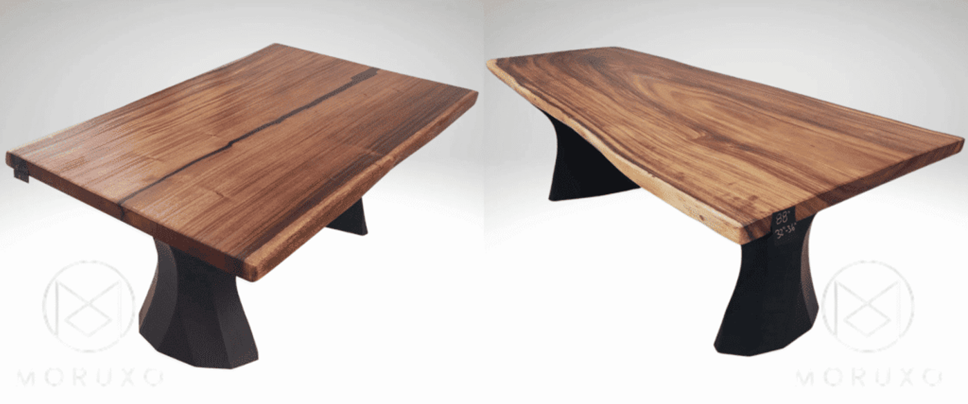 Live-edge walnut dining table with sculpted matte-black pedestal legs, natural grain and subtle epoxy-filled center crack.
