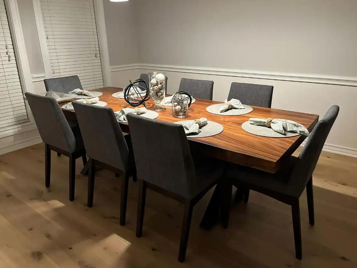 An image featuring a live edge accent table, highlighting the organic and natural edge of the wood, adding a unique and eye-catching element to the piece.