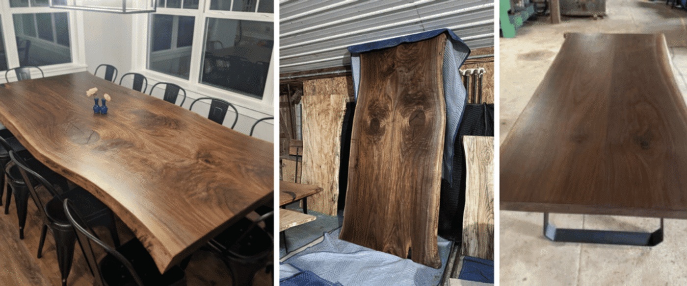 Walnut live-edge slab dining table with natural grain and black metal U-shaped base in workshop