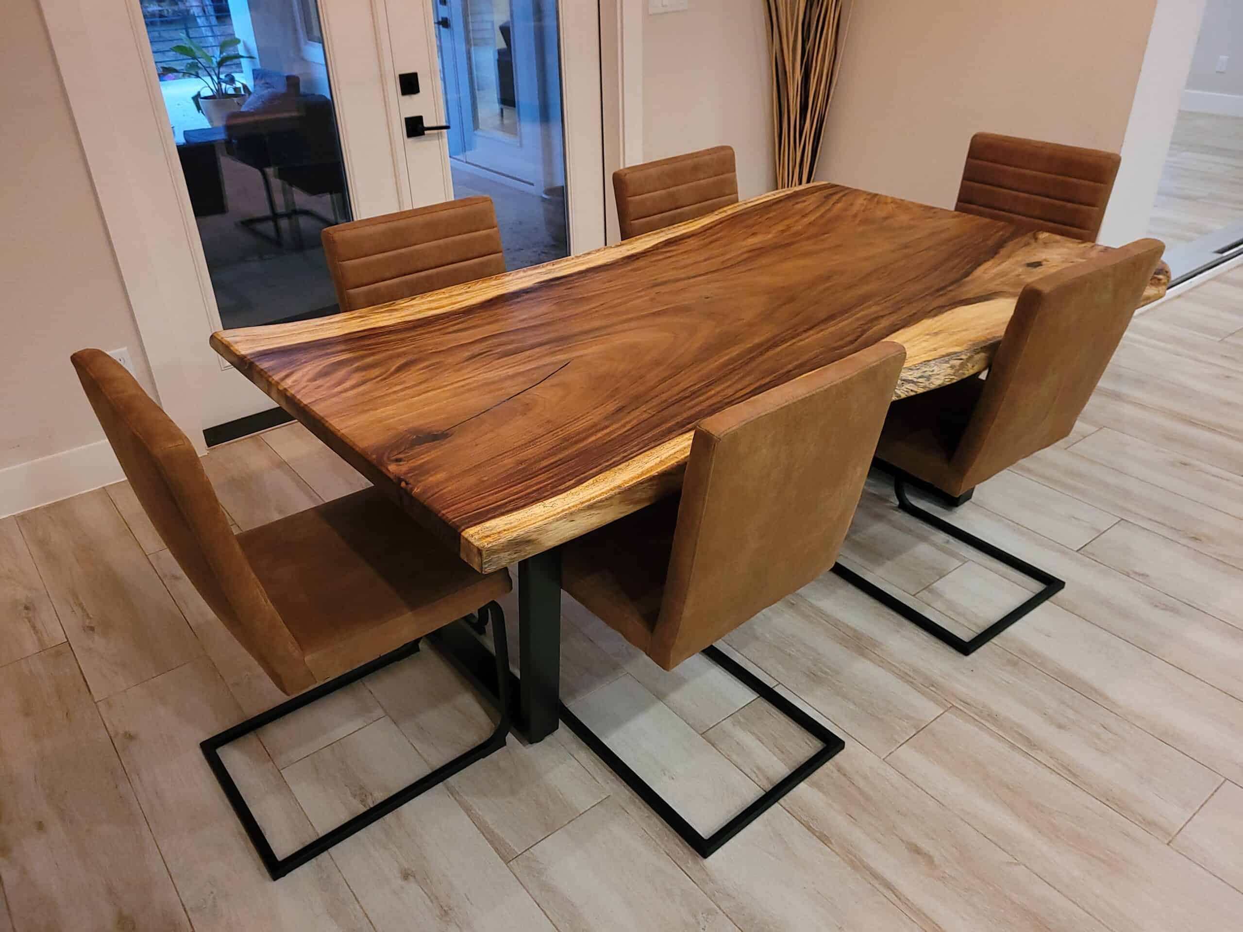 As patrons gather around these exquisite pieces, conversations flow effortlessly, making every meal a shared experience. The live edge wood's story becomes a topic of discussion, connecting diners with nature and the craftsmanship that brought the table to life.