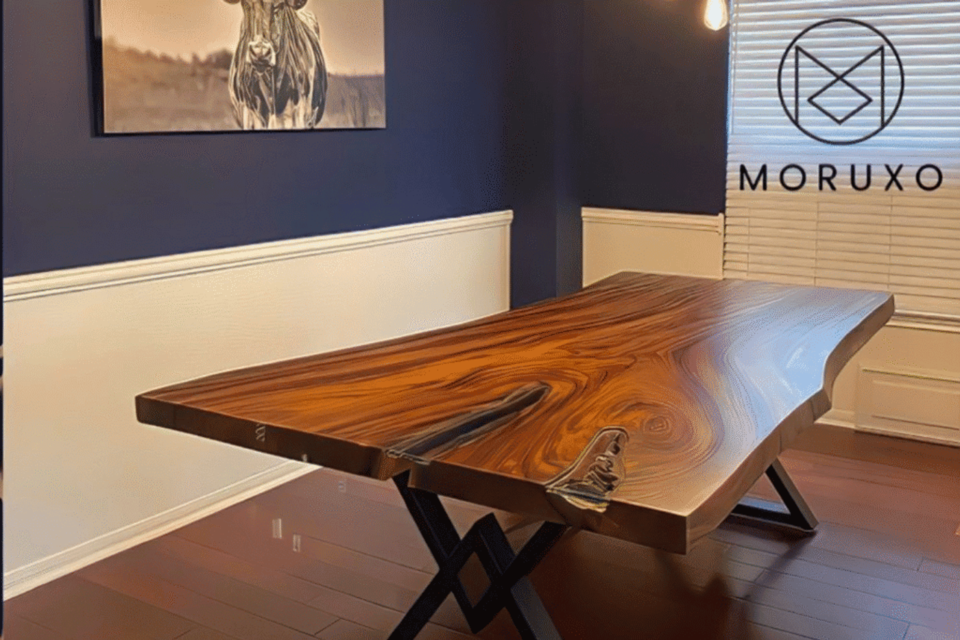 Live edge wood table with sleek metal legs, showcasing natural grain patterns. Modern, rustic design perfect for dining or office spaces.