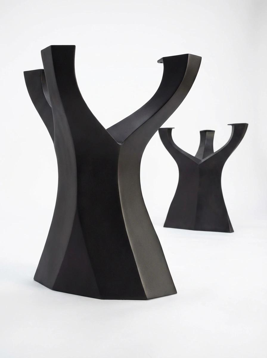 Tree table legs in matte black with an organic branch-inspired silhouette.