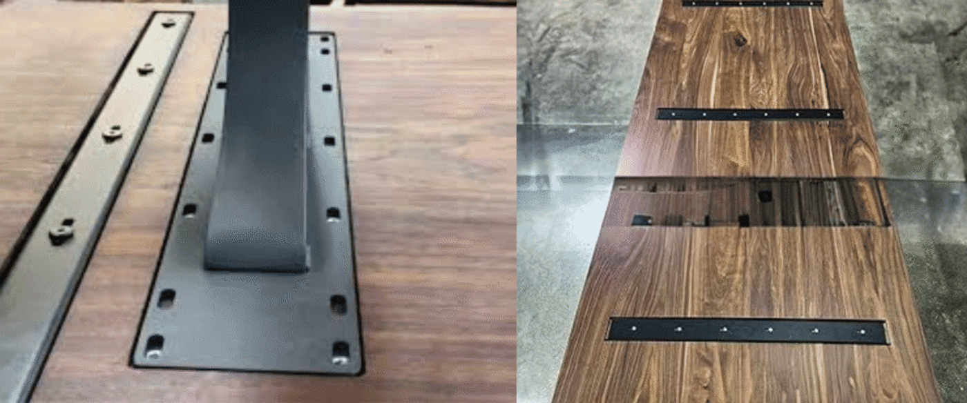 Metal brackets attached to wooden surfaces for structural support and stability.