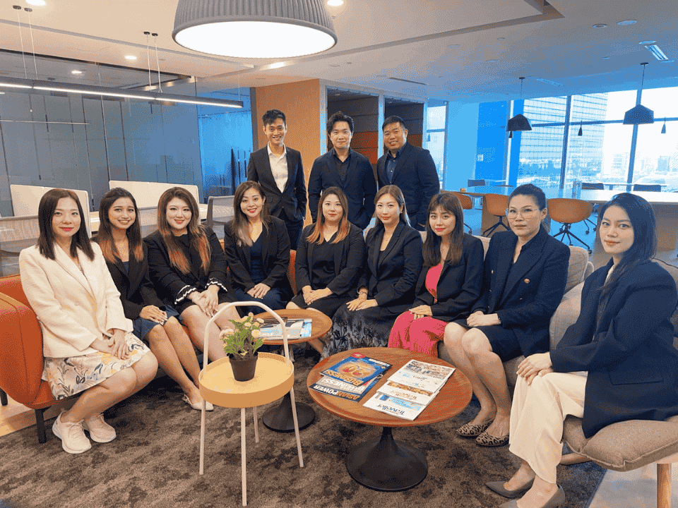 The Singapore Top Immigration consulting team at their Marina Bay office