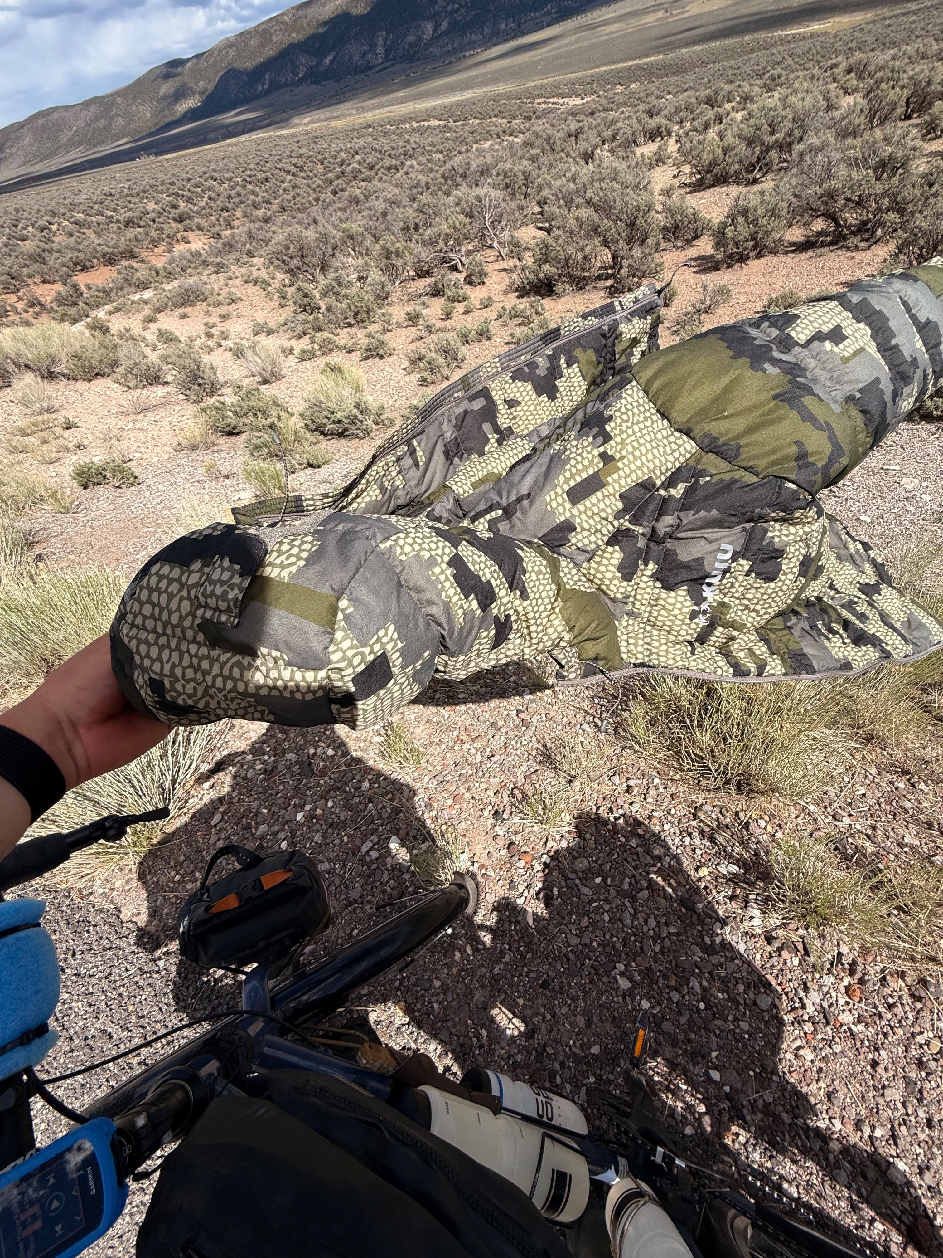 The jacket lying in desert scrub beside the road