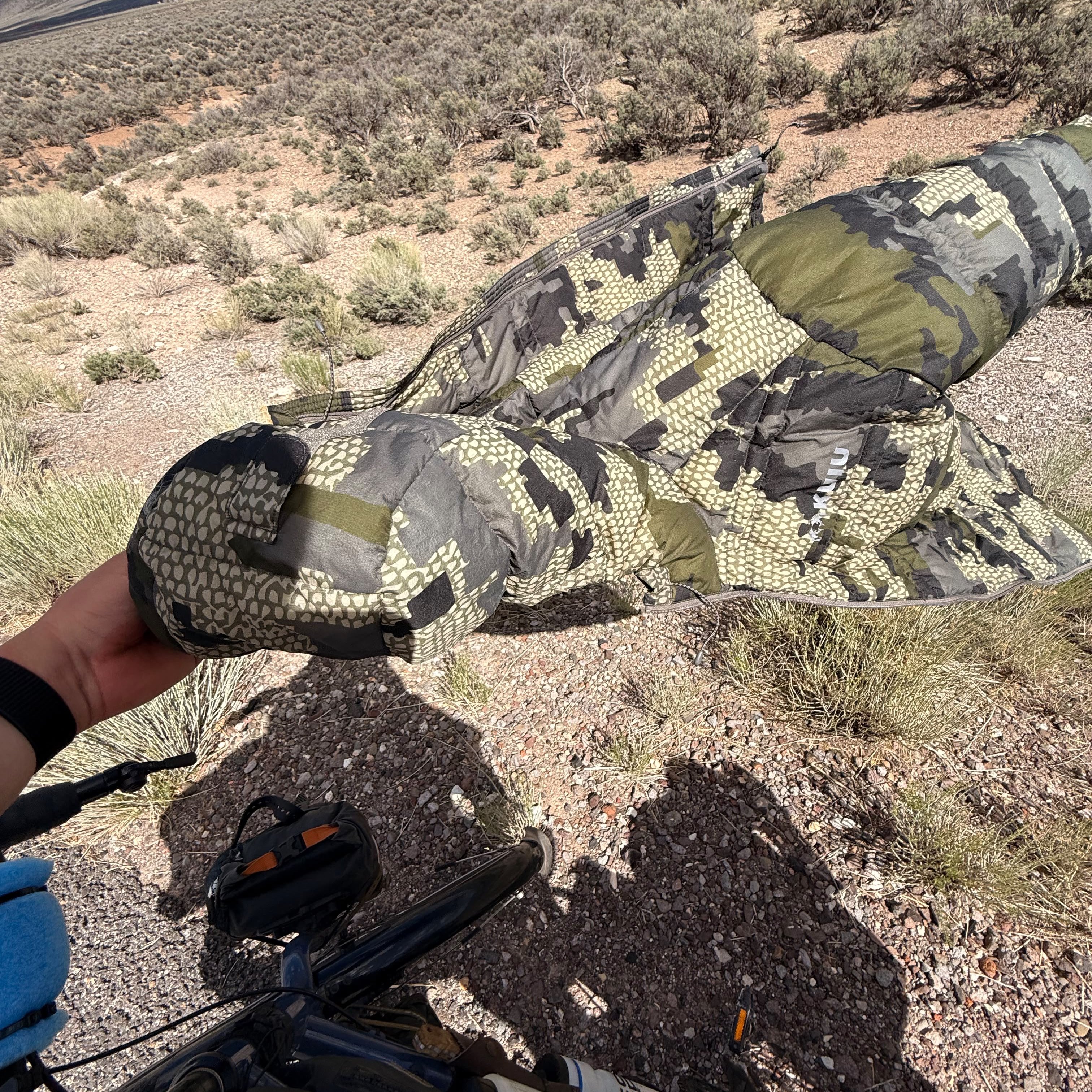 The jacket lying in desert scrub beside the road