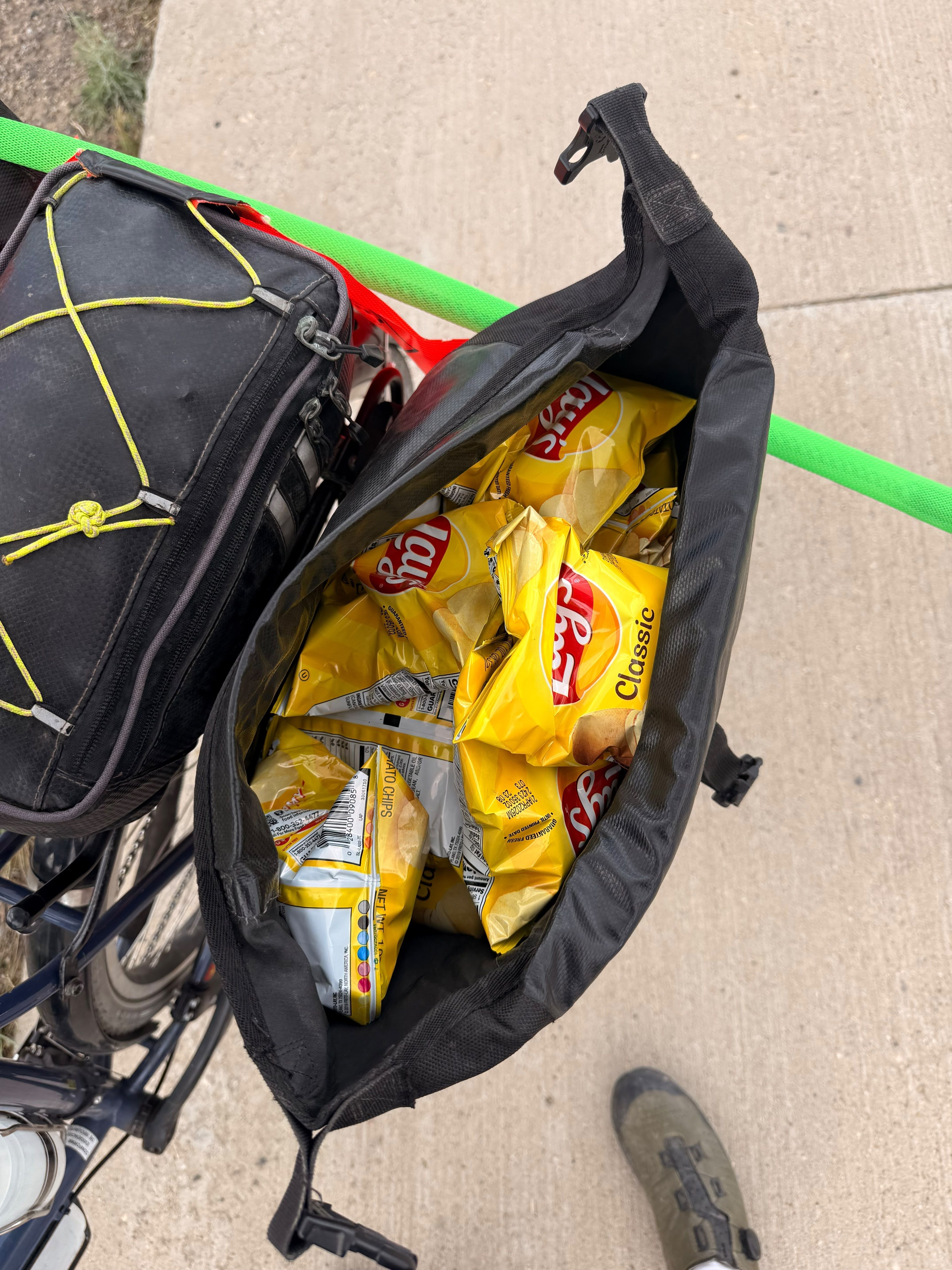 Packets of Lay's stuffed into a bicycle pannier