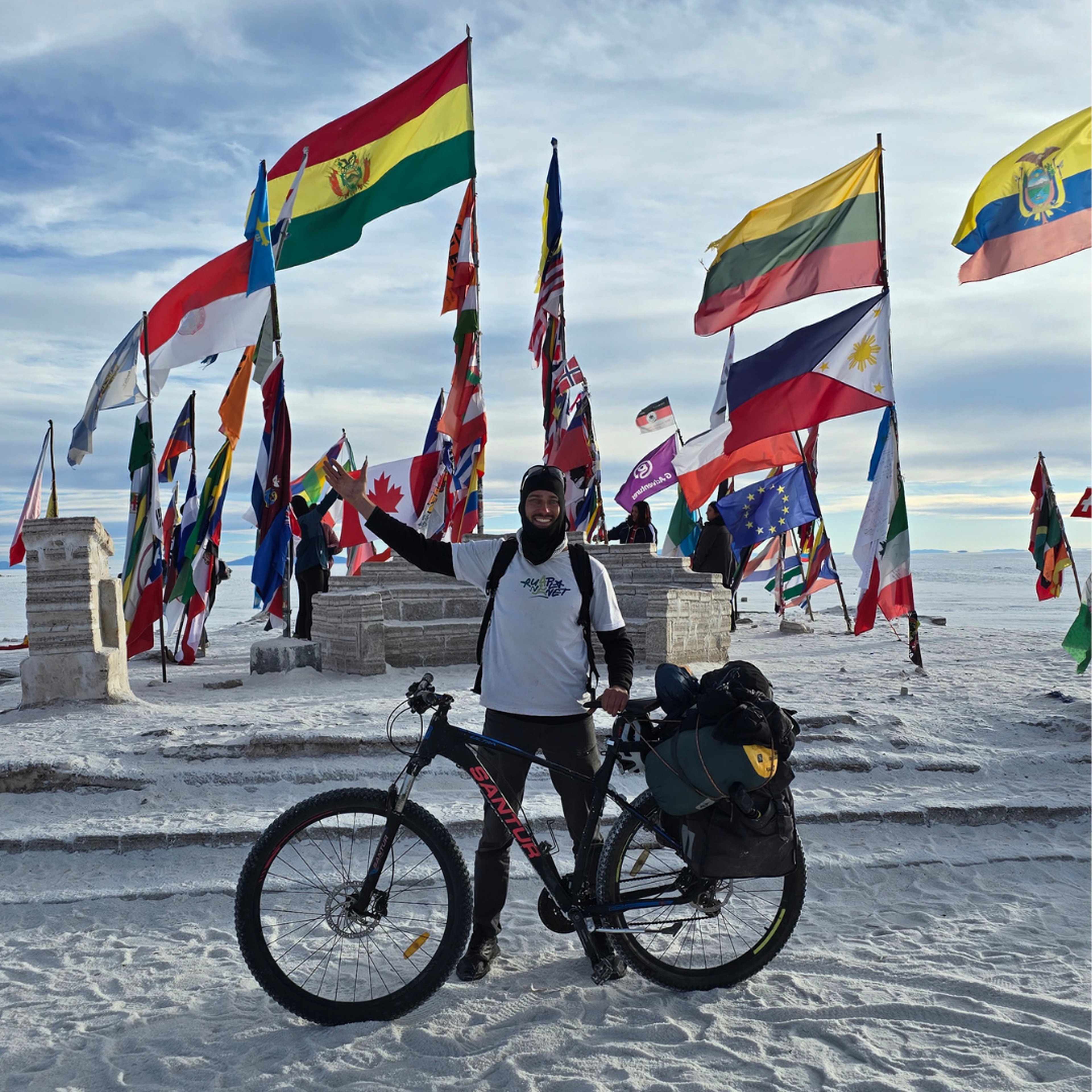 The Salar de Uyuni salt flats stretching to the horizon in Bolivia.