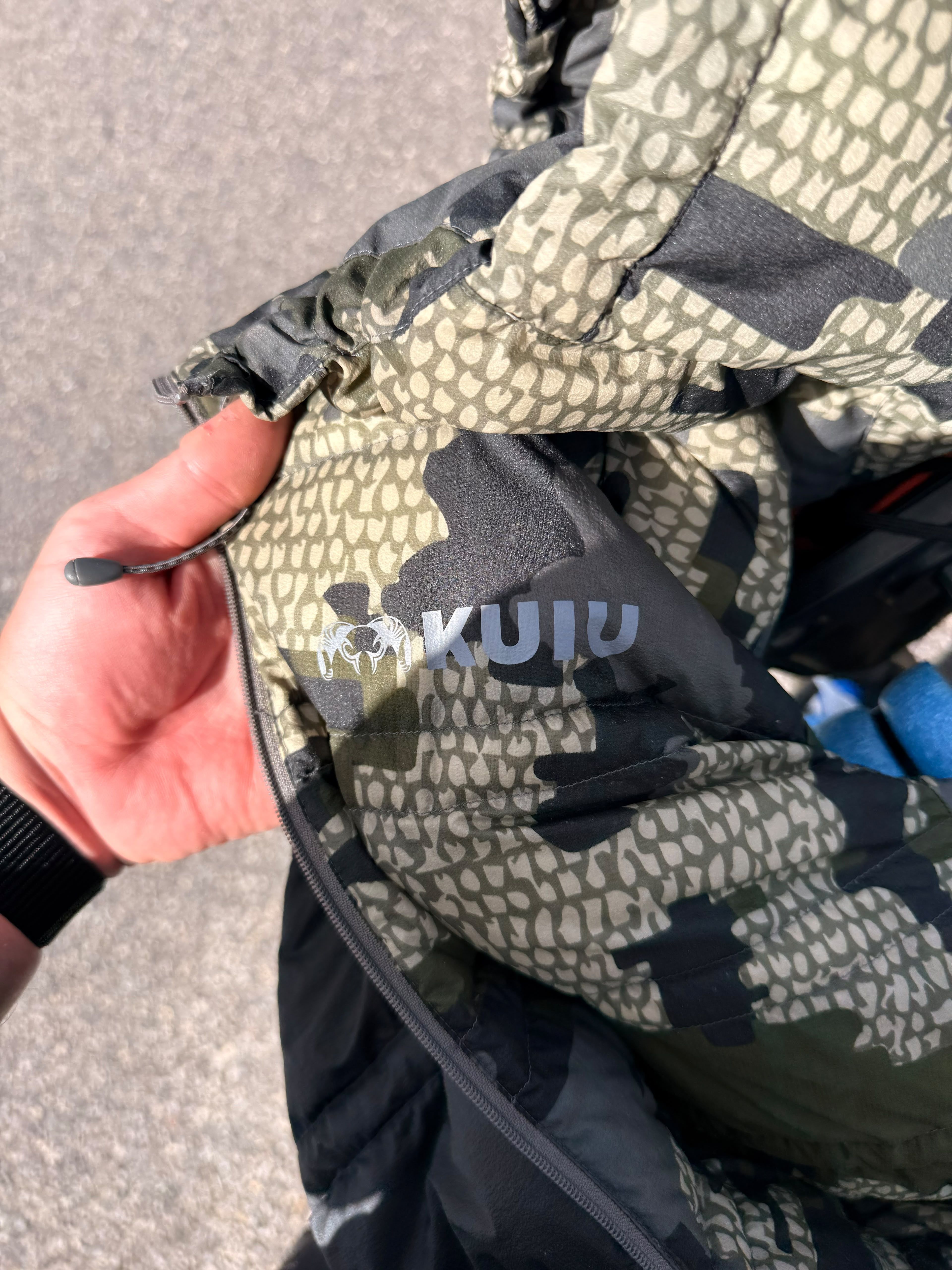 Close up of the Kuiu logo on the jacket