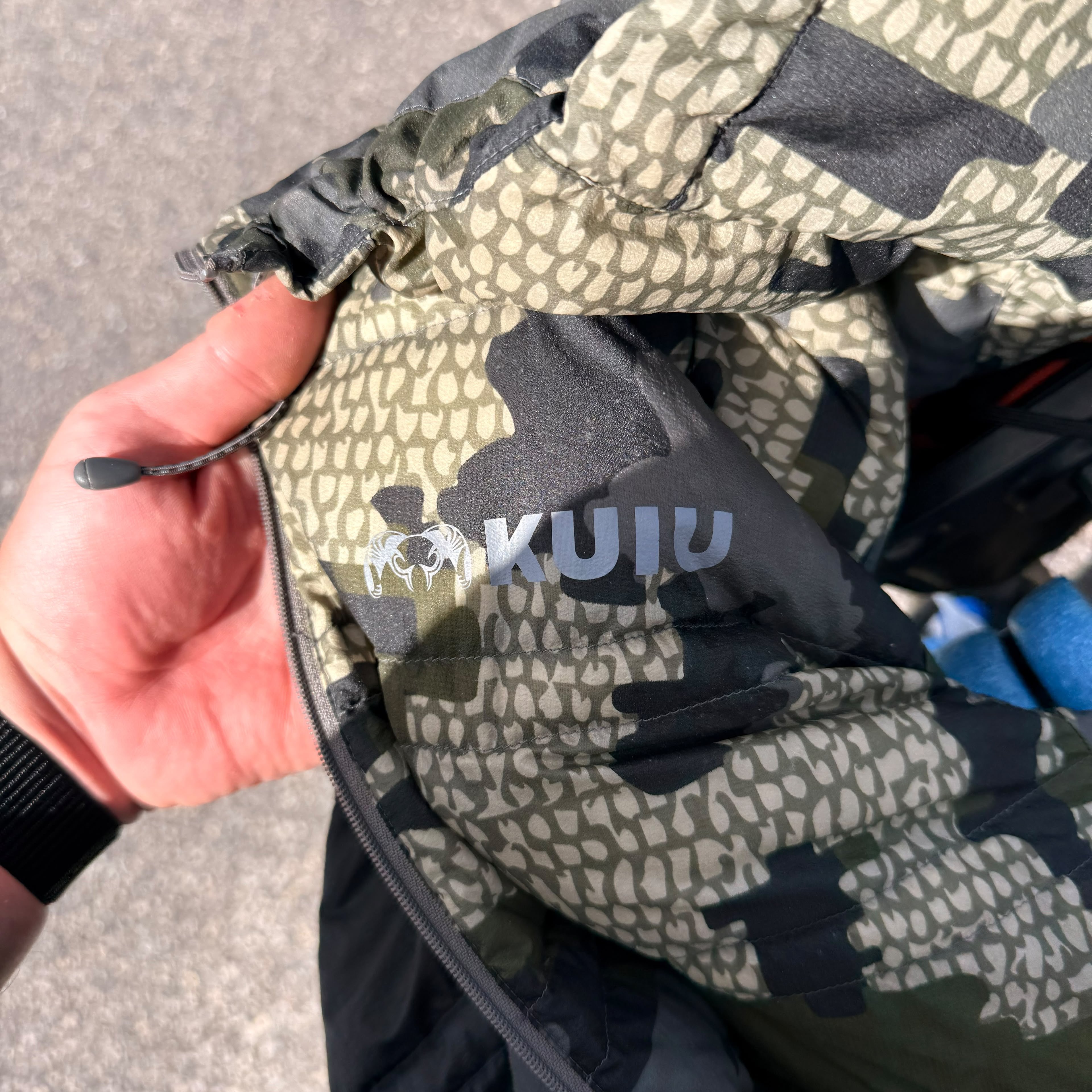 Close up of the Kuiu logo on the jacket