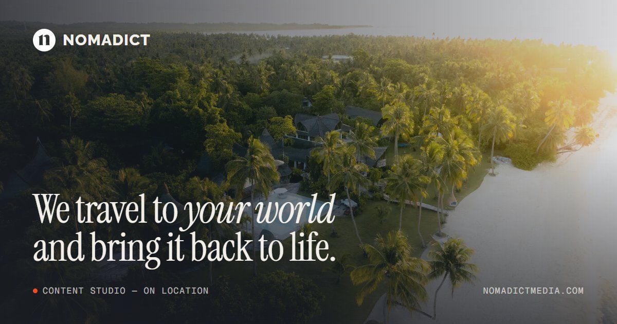 Nomadict Media home page with the line “We travel to your world and bring it back to life” over an aerial jungle shot
