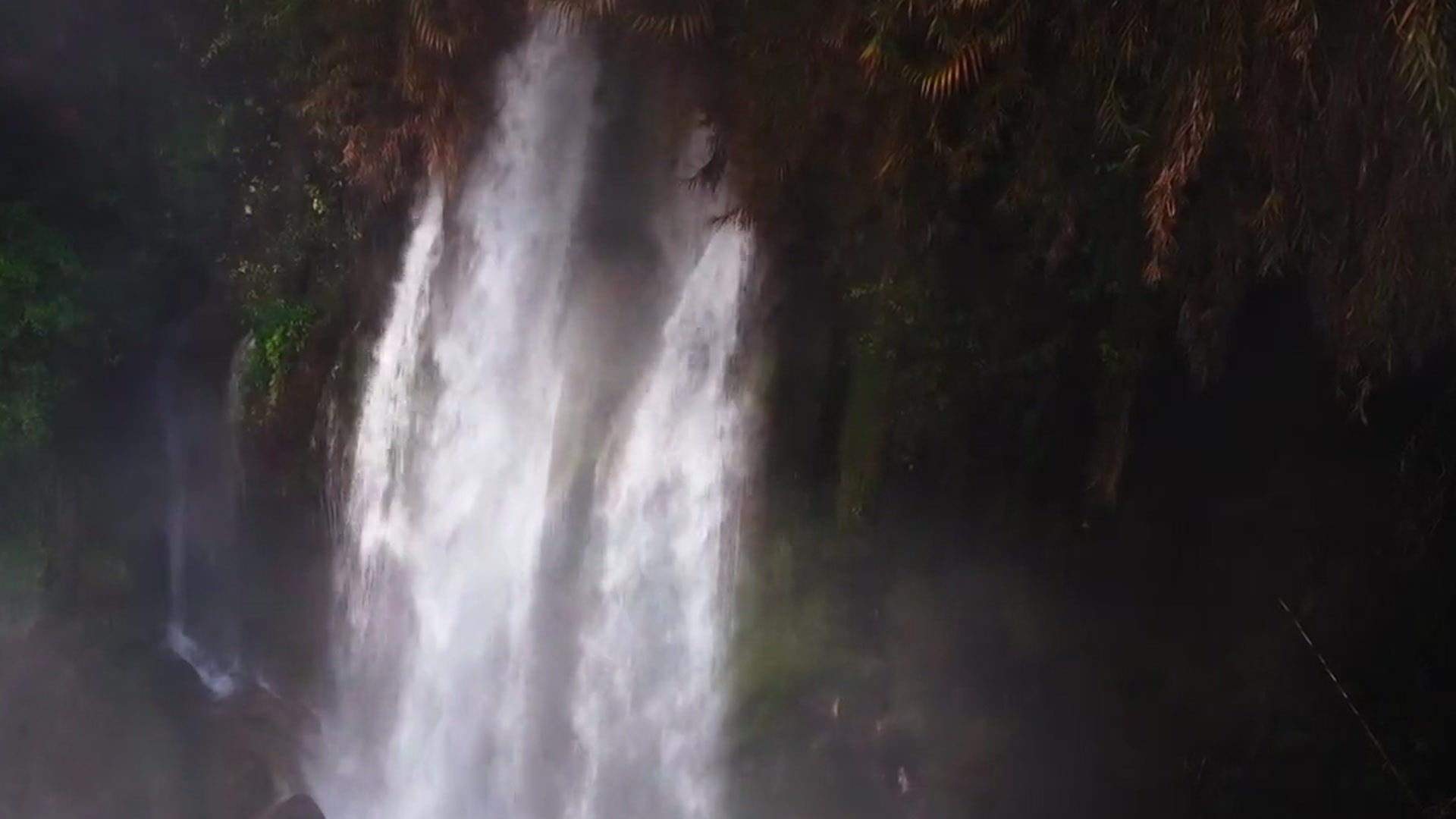 A detail of the waterfall in both versions, almost identical