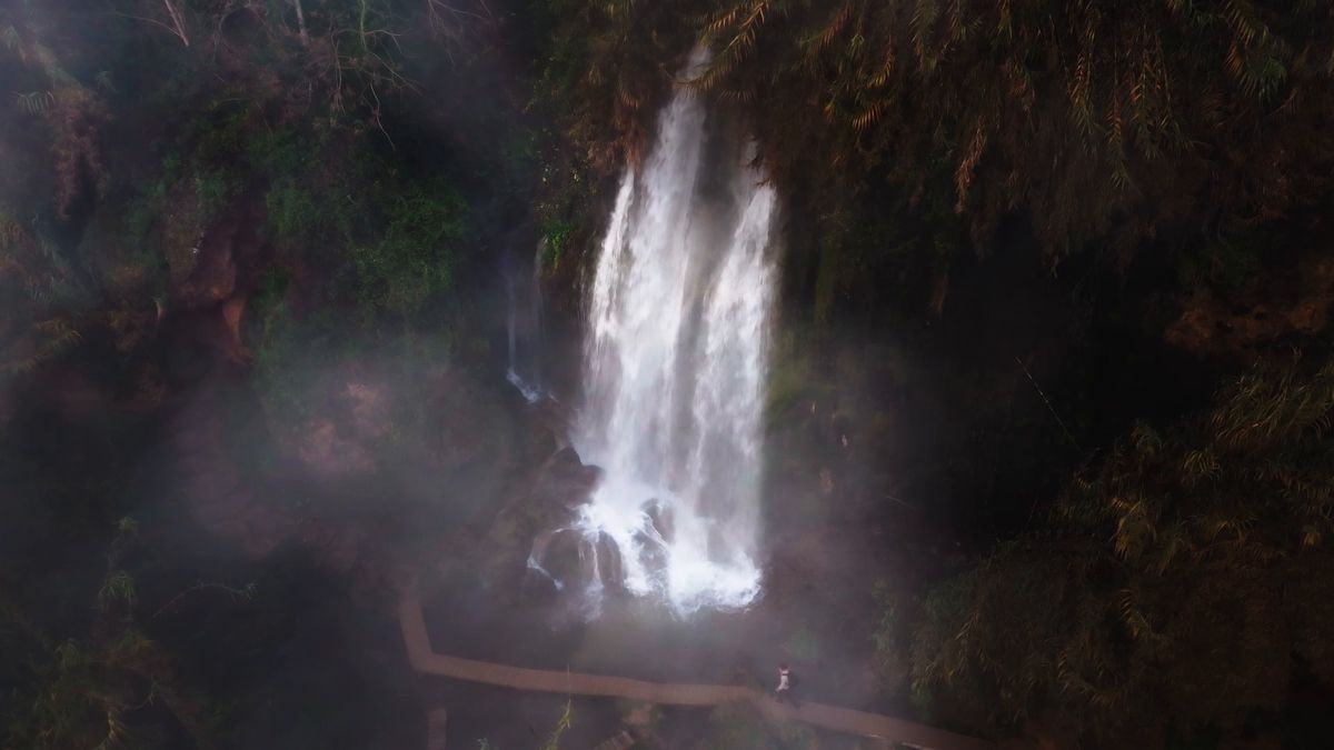 The waterfall in Anna through the mist, seen from a drone
