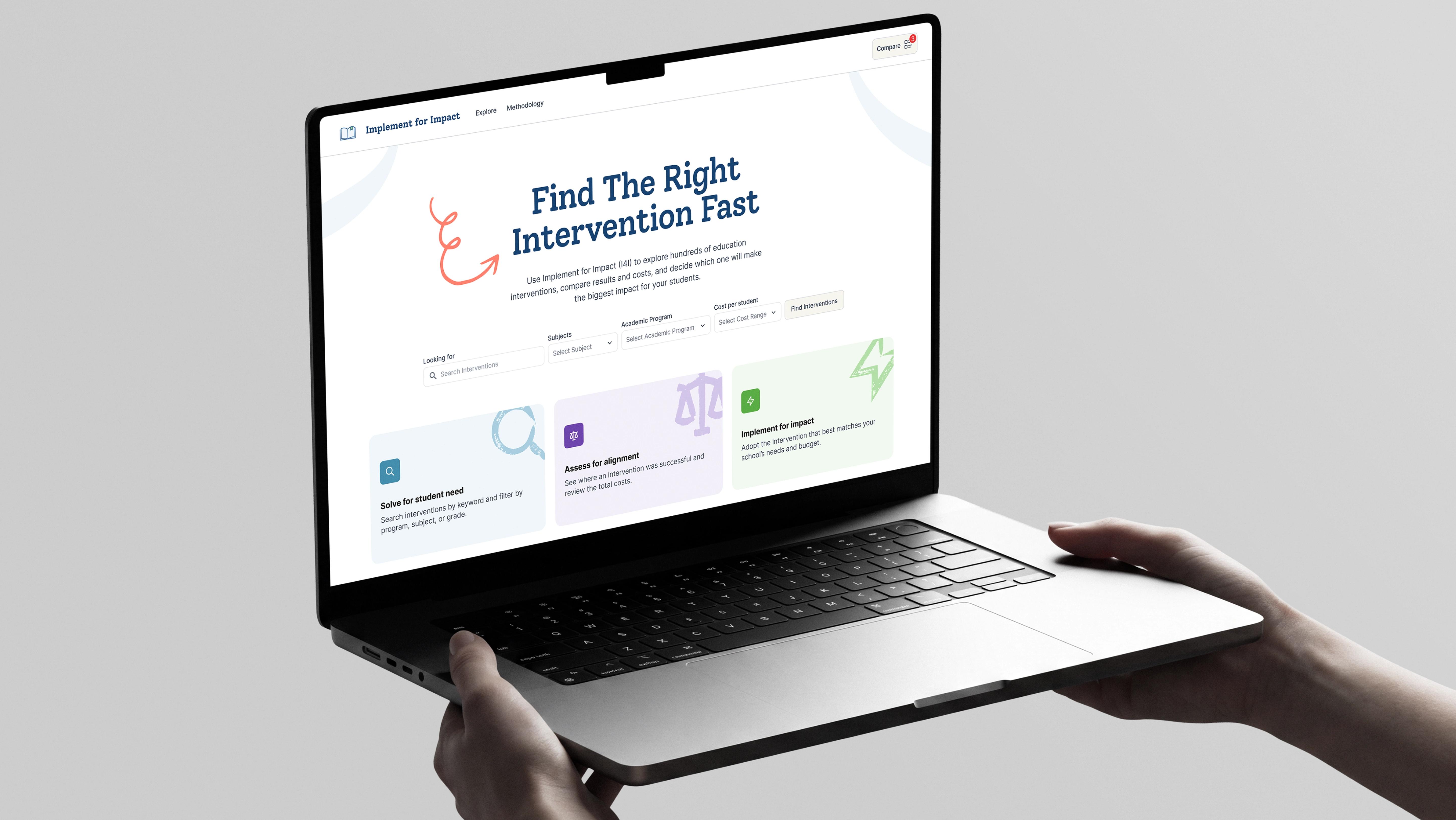 Hands holding a laptop displaying the Implement for Impact website, featuring an intervention search tool, filters, and educational resources.