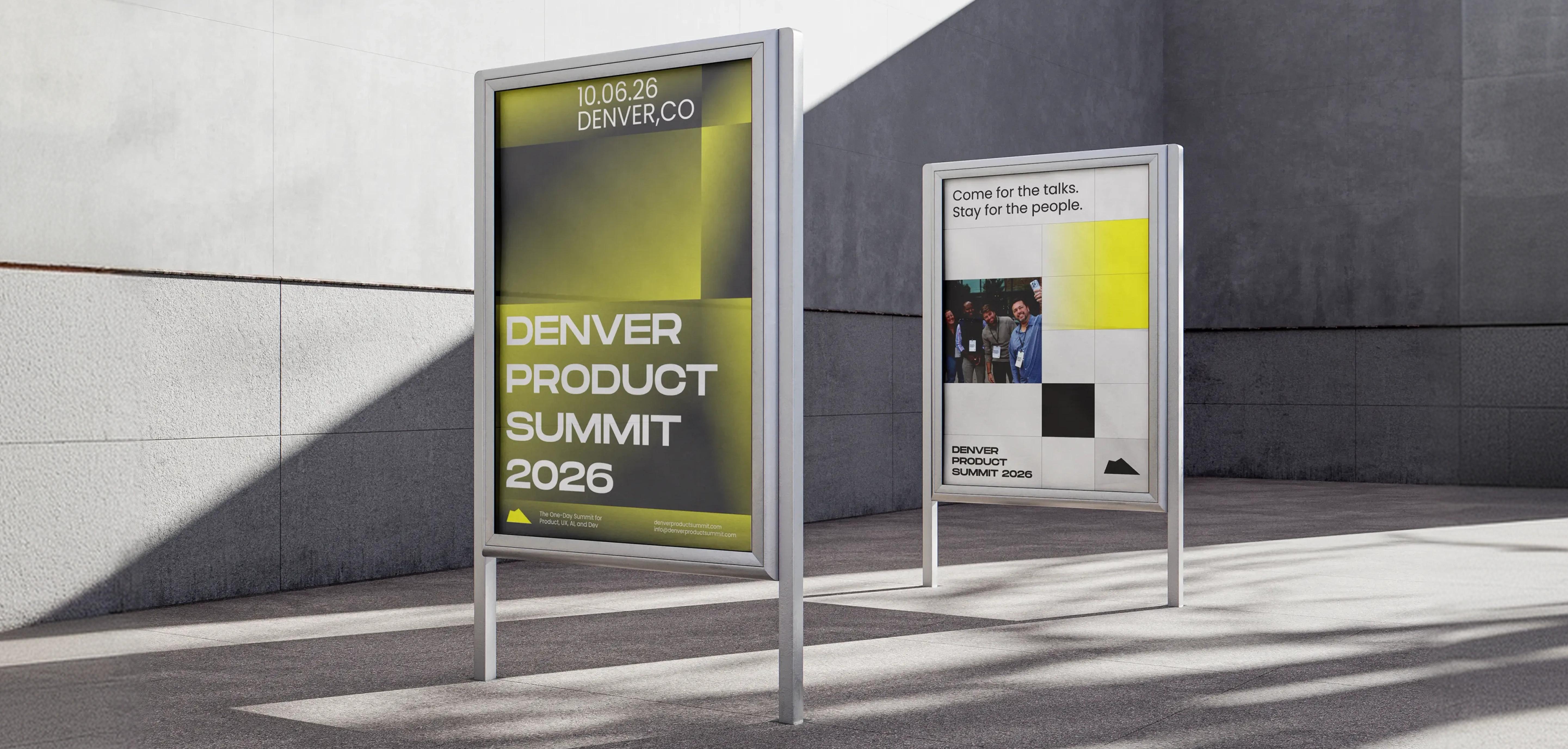 Two Denver Product Summit 2026 posters on outdoor stands, showing the event’s yellow and black brand, mountain logo and the line “Come for the talks. Stay for the people.”