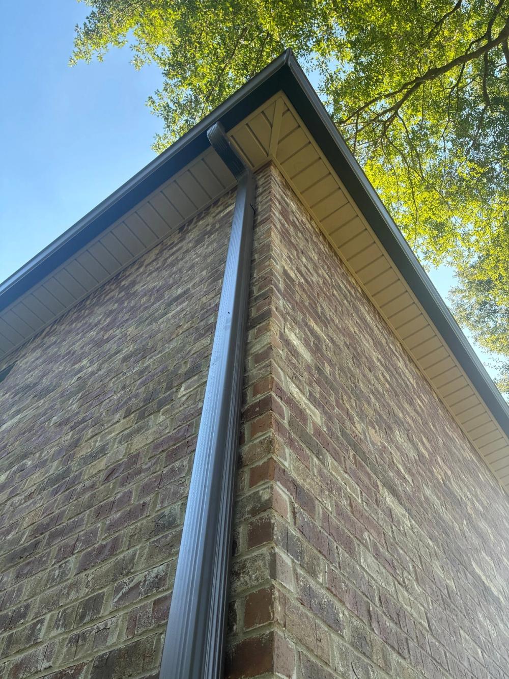 After photo of a Seamless 6" K-style gutters in Musket Brown completed by Southeast Roofing in Petal, MS.