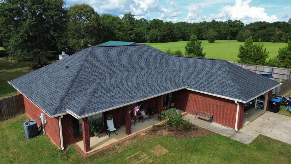 After photo of a GAF Timberline HDZ shingle roof in Charcoal completed by Southeast Roofing in Perkinston, MS.